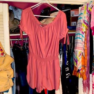 Cute off the shoulder romper. Never been worn.